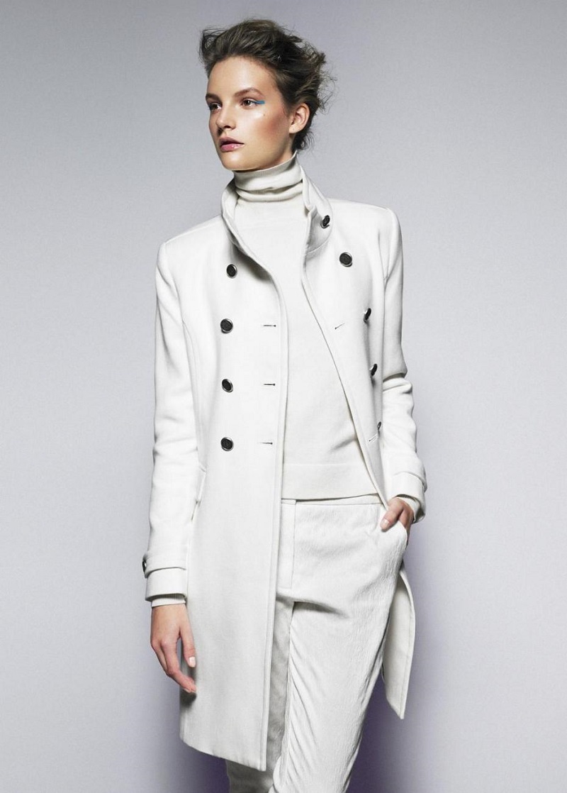white coat and turtleneck