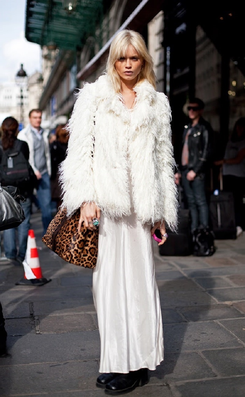 white fur and leopard bag