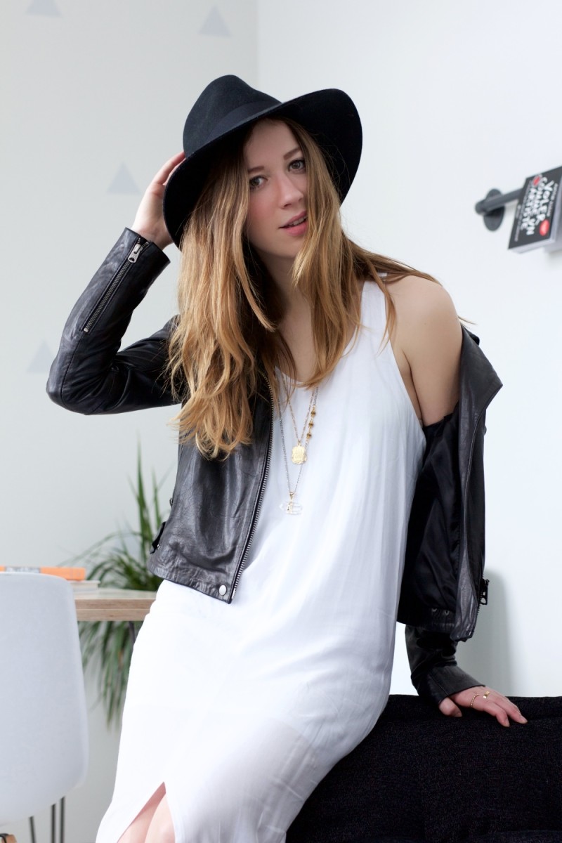leather jacket and white dress in winter with a boho vibe